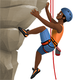 man climbing: medium-dark skin tone