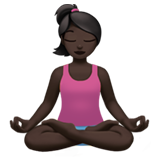 woman in lotus position: dark skin tone