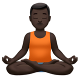 man in lotus position: dark skin tone