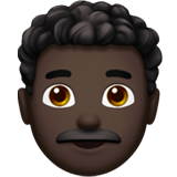 man: dark skin tone, curly hair
