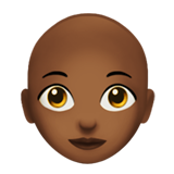 woman: medium-dark skin tone, bald