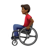 man in manual wheelchair: medium-dark skin tone