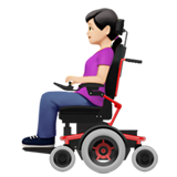 woman in motorized wheelchair: light skin tone
