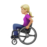 woman in manual wheelchair: medium-light skin tone