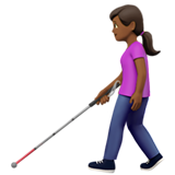 woman with white cane: medium-dark skin tone