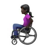 woman in manual wheelchair: dark skin tone