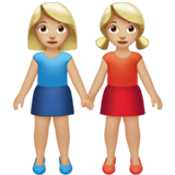women holding hands: medium-light skin tone