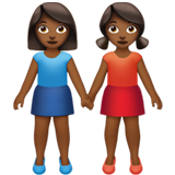 women holding hands: medium-dark skin tone