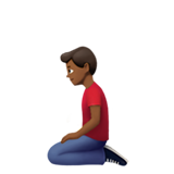man kneeling: medium-dark skin tone