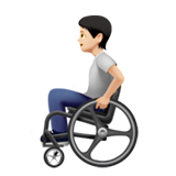 person in manual wheelchair: light skin tone