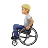 person in manual wheelchair: medium-light skin tone