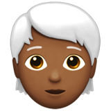 person: medium-dark skin tone, white hair