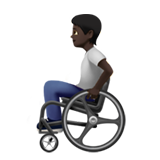 person in manual wheelchair: dark skin tone
