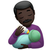 man feeding baby: dark skin tone