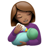 woman feeding baby: medium skin tone