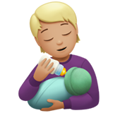 person feeding baby: medium-light skin tone