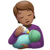 person feeding baby: medium skin tone
