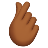 hand with index finger and thumb crossed: medium-dark skin tone