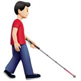 man with white cane facing right: light skin tone