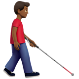 man with white cane facing right: medium-dark skin tone