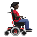 man in motorized wheelchair facing right: dark skin tone