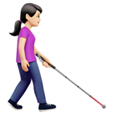 woman with white cane facing right: light skin tone