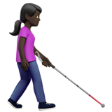 woman with white cane facing right: dark skin tone