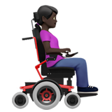 woman in motorized wheelchair facing right: dark skin tone