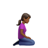 woman kneeling facing right: medium-dark skin tone