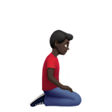 man kneeling facing right: dark skin tone