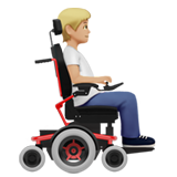 person in motorized wheelchair facing right: medium-light skin tone