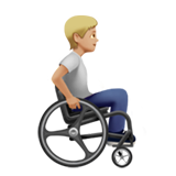person in manual wheelchair facing right: medium-light skin tone