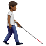 person with white cane facing right: medium-dark skin tone