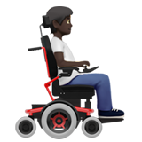 person in motorized wheelchair facing right: dark skin tone