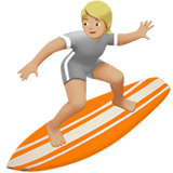 person surfing: medium-light skin tone