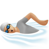 person swimming: medium-light skin tone