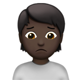 person frowning: dark skin tone