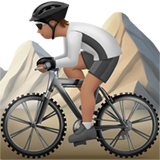 person mountain biking: medium skin tone