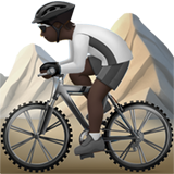 person mountain biking: dark skin tone