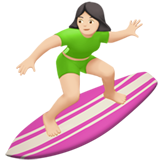 woman surfing: light skin tone