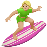 woman surfing: medium-light skin tone