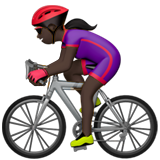 woman biking: dark skin tone