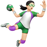 woman playing handball: light skin tone