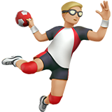 man playing handball: medium-light skin tone