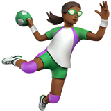 woman playing handball: medium-dark skin tone
