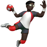 man playing handball: dark skin tone