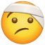 Emoji con benda U + 1F915